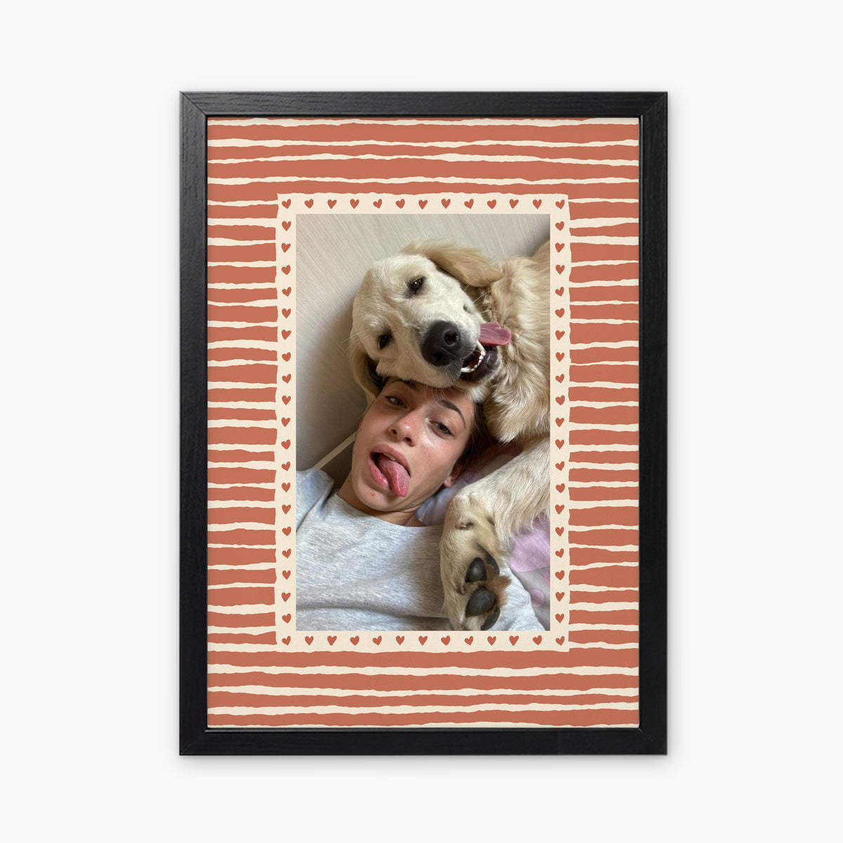 Hearts custom pet photo print in Terracotta, in a black frame, with an example photo