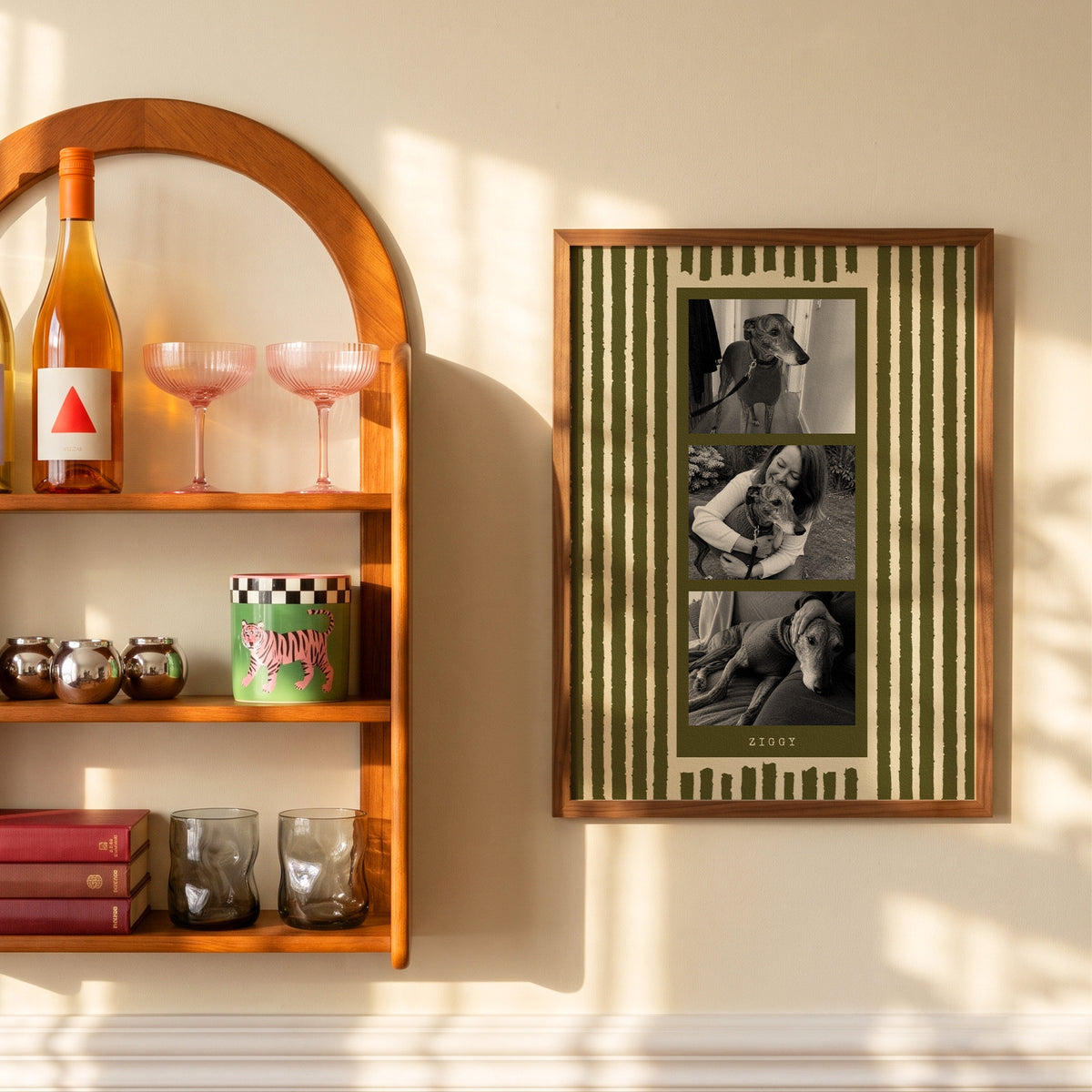 Photo strip custom pet photo print in Olive Green, in a wooden frame on a sunlit wall beside a shelf